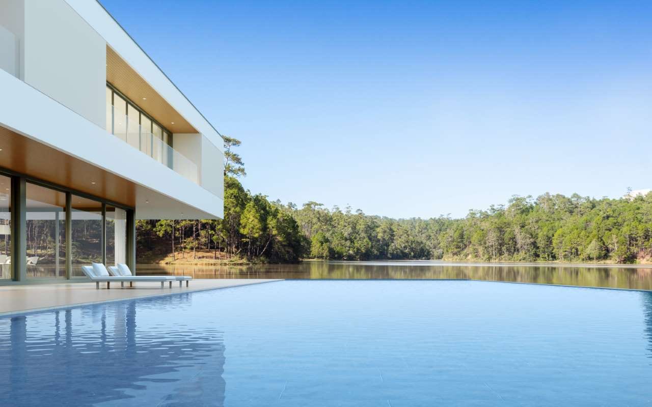3D render of a modern house with a swimming pool