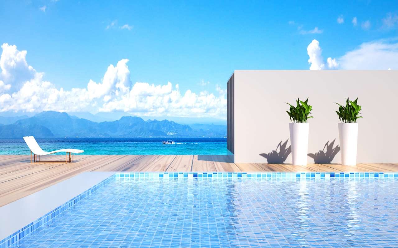 3D rendering of an outdoor swimming pool under a beautiful sky