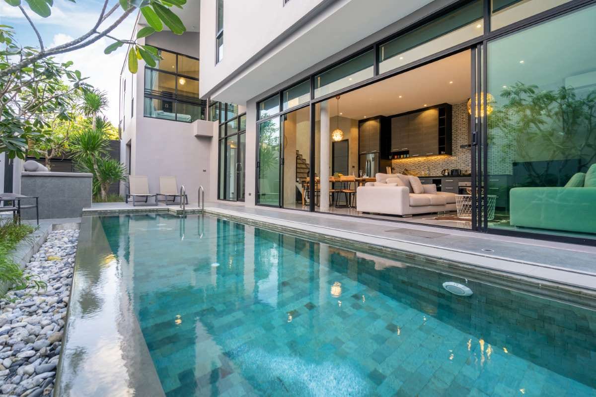 Exterior home with swimming pool and house exterior