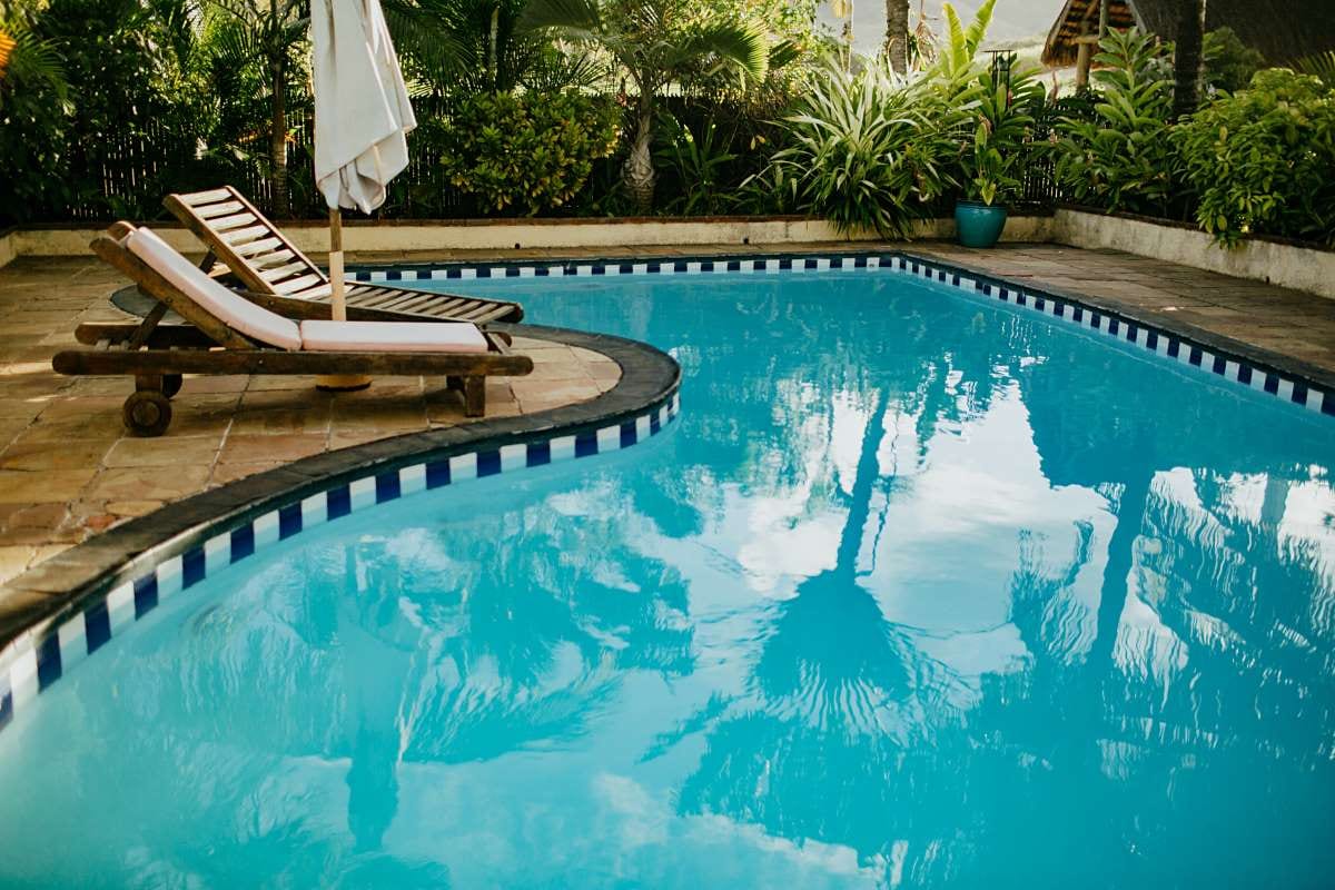 High-angle view of a swimming pool and yard