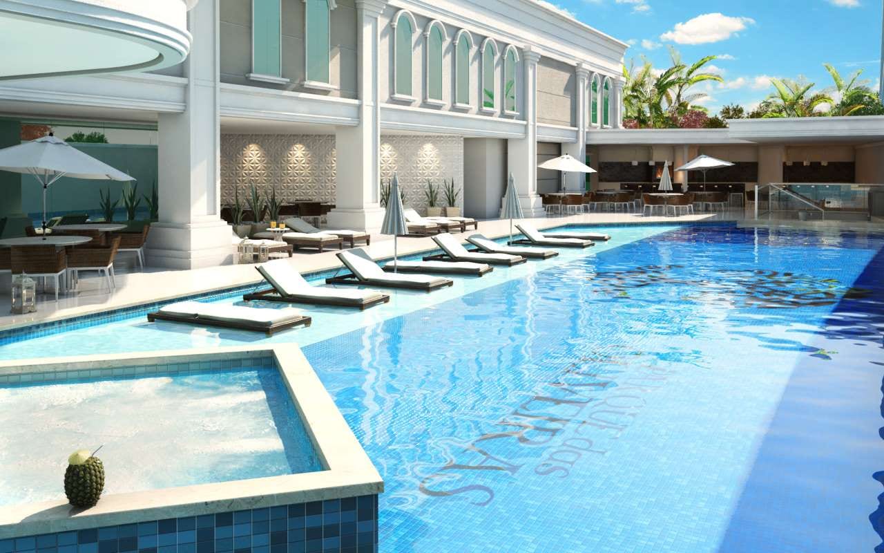 Luxury swimming pool at a hotel or spa, suggesting upscale apartments