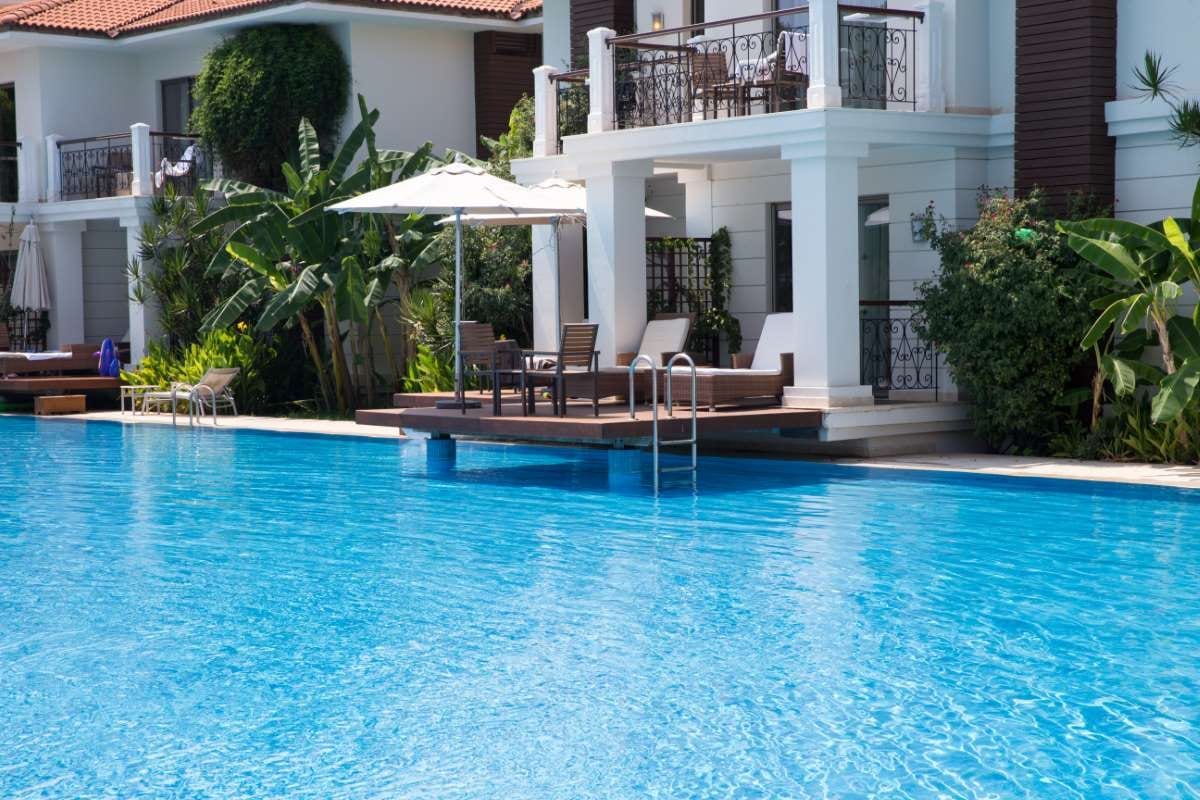 Resort swimming pool with poolside vacation scene