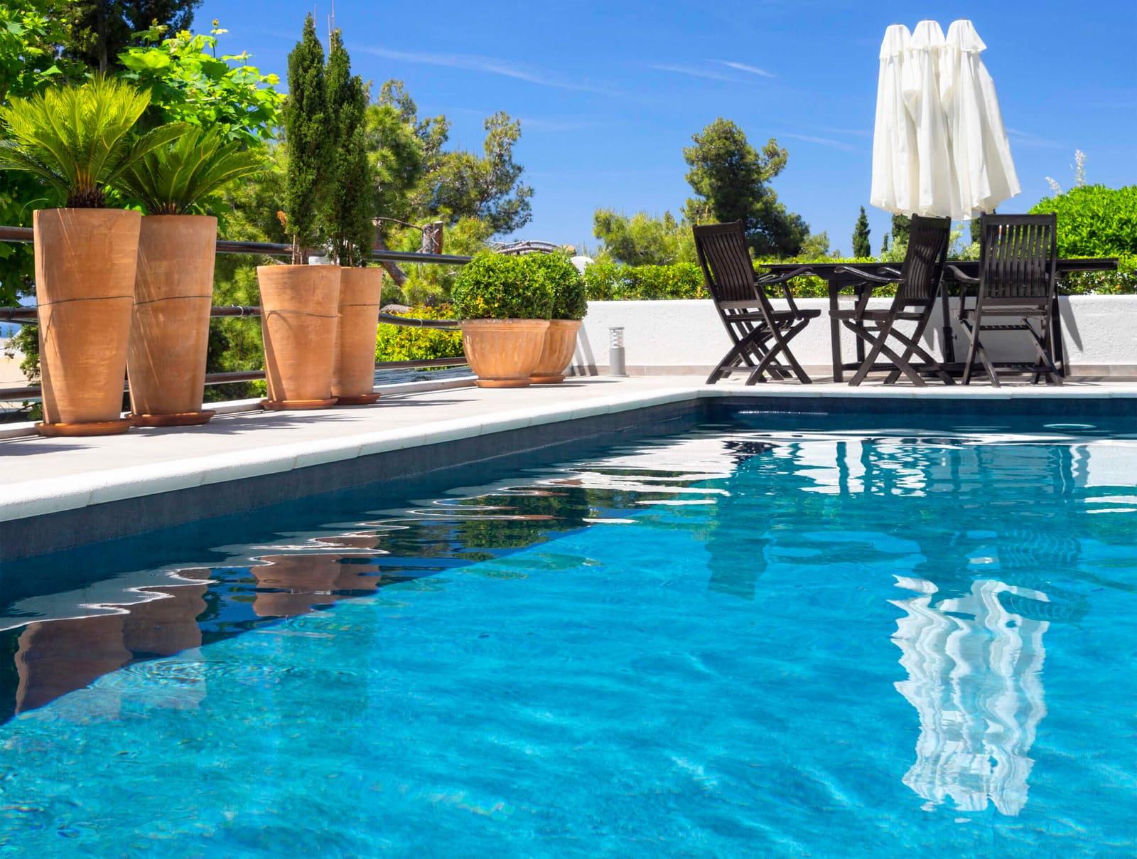 Swimming pool with a sunny apartment view in Athens, Greece